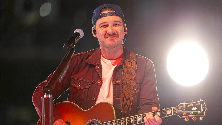 Country Star Morgan Wallen Showcases Christian Faith with Bible Verse on Leg Cast During Performance