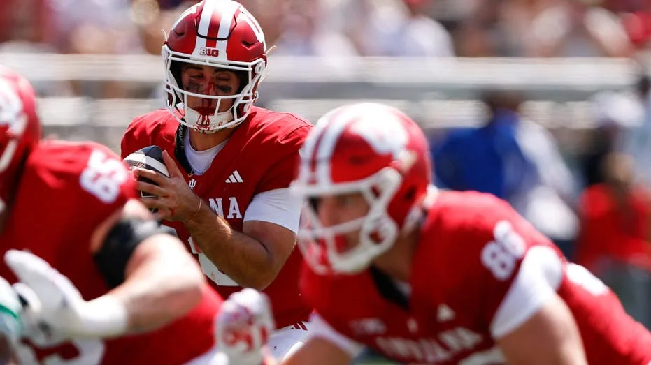 Indiana Quarterback Josh Hoover Demonstrates Remarkable Resilience in Debut Following Brutal Facemask